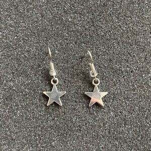 Silver star earrings $10